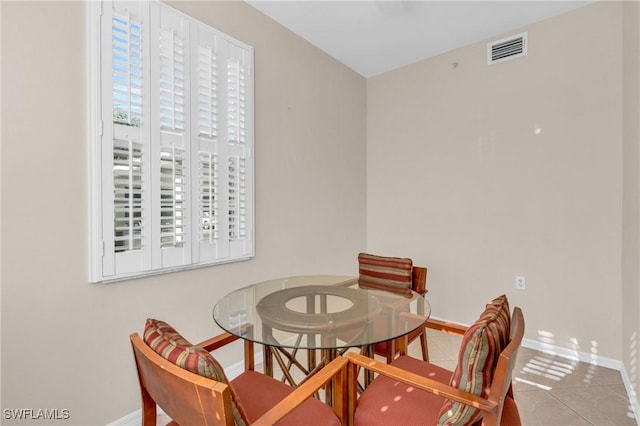 3970 Loblolly Bay Dr Unit 5-108, Naples, FL 34114 - dining area featuring baseboards and tile patterned floors
