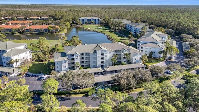 3970 Loblolly Bay Dr Unit 5-108, Naples, FL 34114 - drone / aerial view of a forest, a nearby body of water, and apartment complex / building