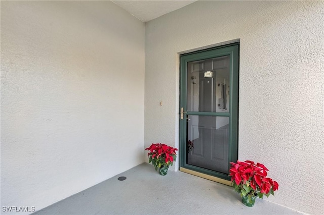 3970 Loblolly Bay Dr Unit 5-108, Naples, FL 34114 - entrance to property with stucco siding