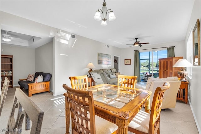 3970 Loblolly Bay Dr Unit 5-108, Naples, FL 34114 - dining space with ceiling fan, light tile patterned flooring, and baseboards