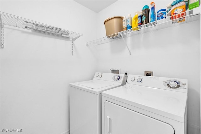 3970 Loblolly Bay Dr Unit 5-108, Naples, FL 34114 - washroom featuring independent washer and dryer