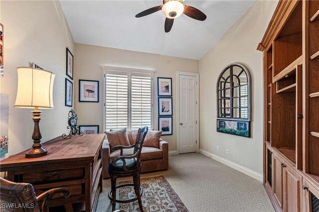 office space featuring ceiling fan and carpet flooring