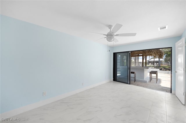 empty room with ceiling fan