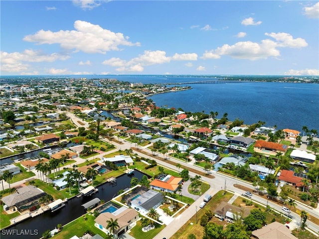 bird's eye view with a water view