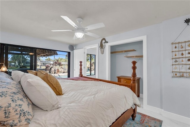 bedroom with a closet and ceiling fan