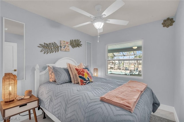 bedroom featuring ceiling fan