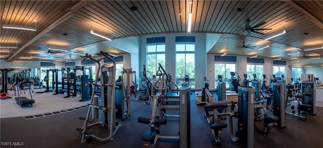 gym with ceiling fan and wooden ceiling