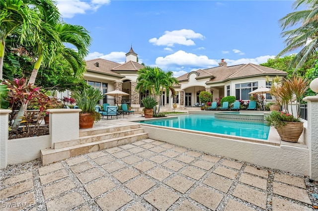 view of pool with a patio area