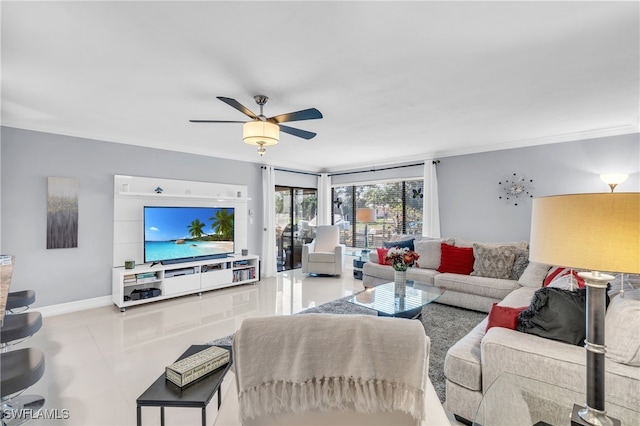 tiled living room featuring ornamental molding and ceiling fan