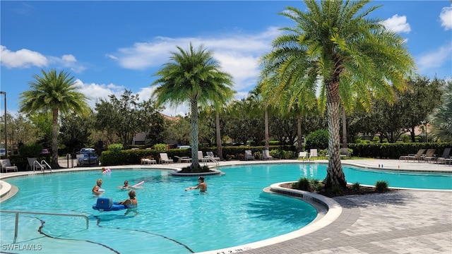 view of swimming pool featuring a patio