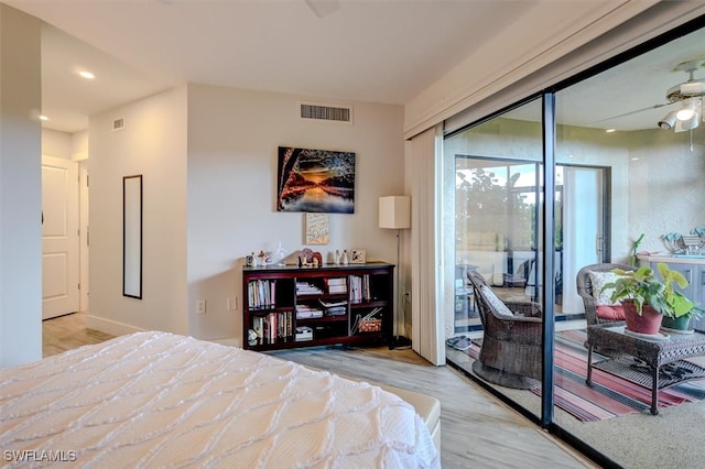 bedroom with access to exterior, light hardwood / wood-style floors, and ceiling fan