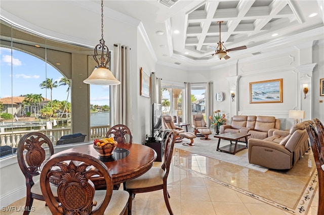 dining room featuring a high ceiling, beamed ceiling, ceiling fan, crown molding, and coffered ceiling