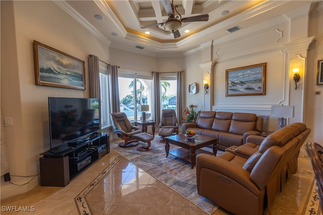 living room featuring a towering ceiling, ceiling fan, crown molding, and coffered ceiling