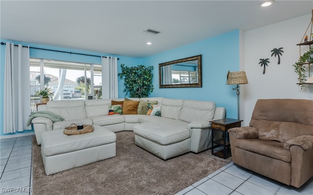 living room with light tile patterned floors