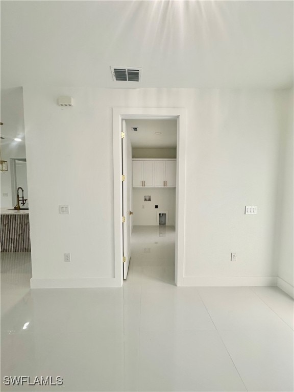 interior space featuring light tile patterned floors