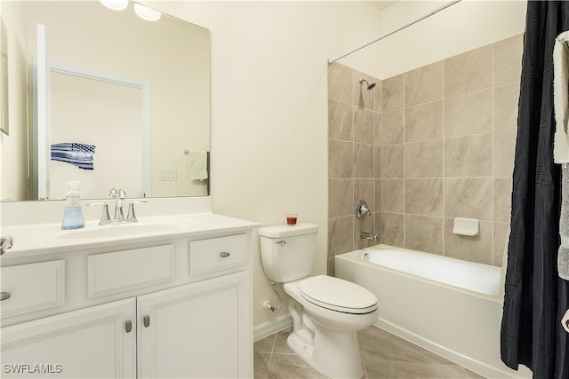 full bathroom with tile patterned flooring, vanity, shower / bath combo with shower curtain, and toilet