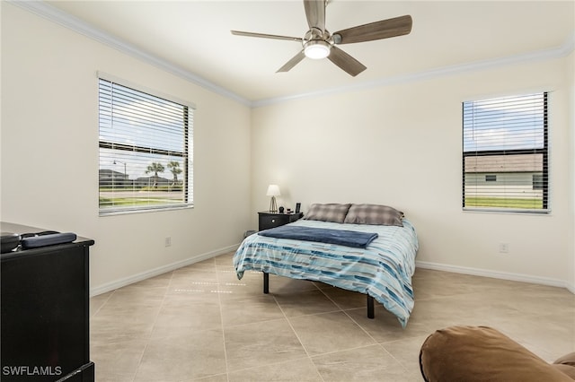 bedroom with ornamental molding, multiple windows, and ceiling fan