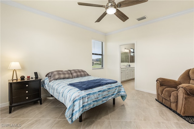 tiled bedroom with ensuite bathroom, ceiling fan, and ornamental molding