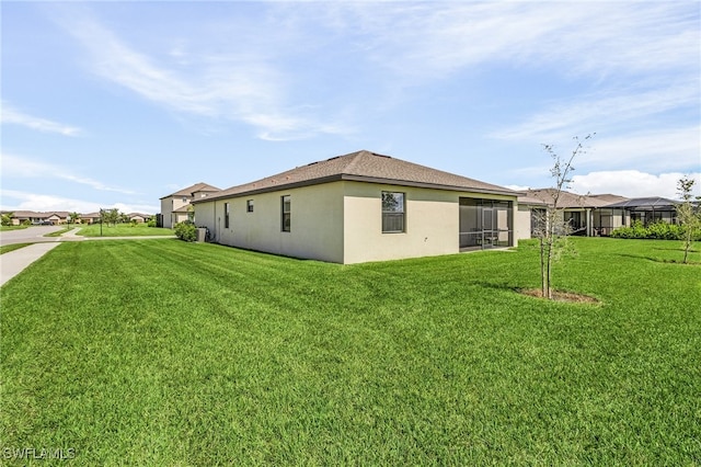 view of property exterior featuring a lawn