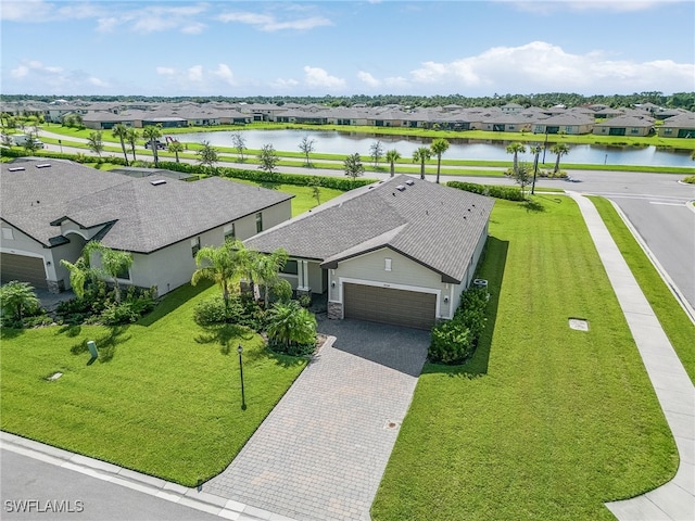 drone / aerial view featuring a water view