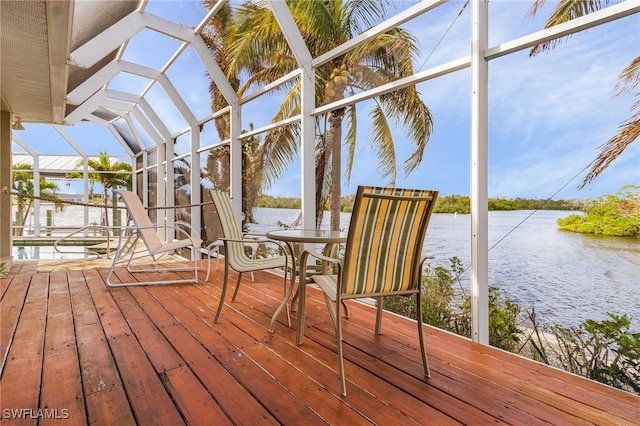 exterior space featuring a water view and a lanai