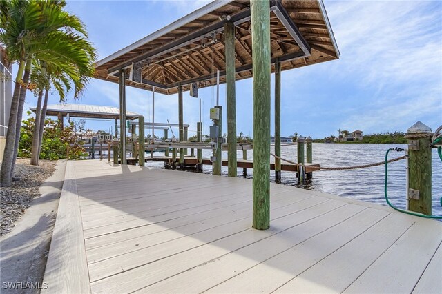 dock area with a water view