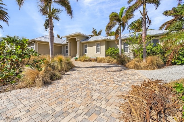 view of front of property featuring a garage