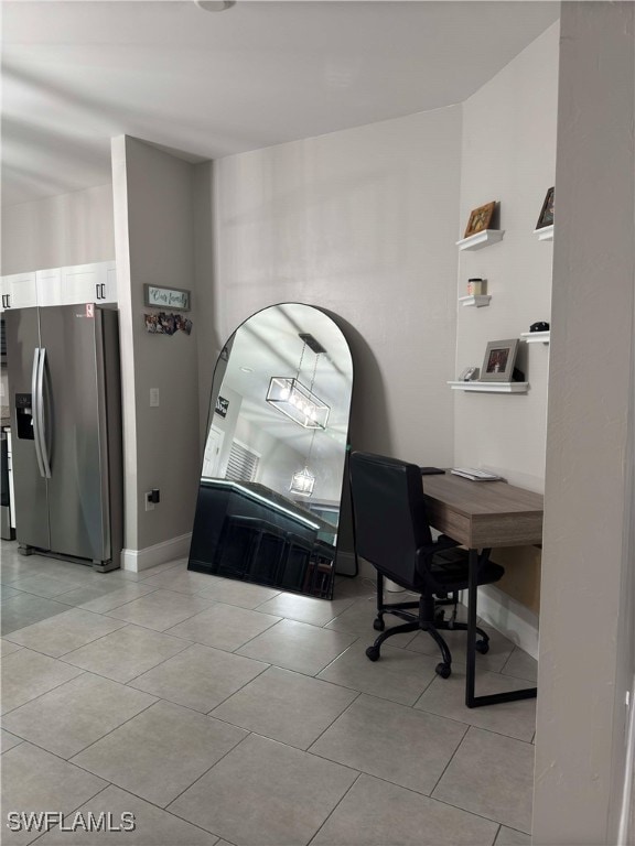 home office featuring light tile patterned flooring