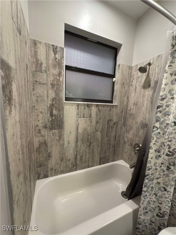 bathroom featuring shower / tub combo