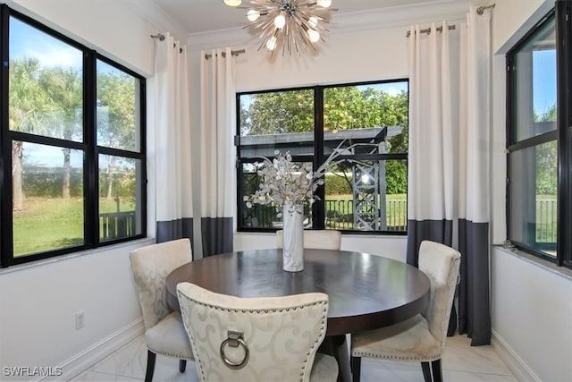 dining room featuring an inviting chandelier and ornamental molding