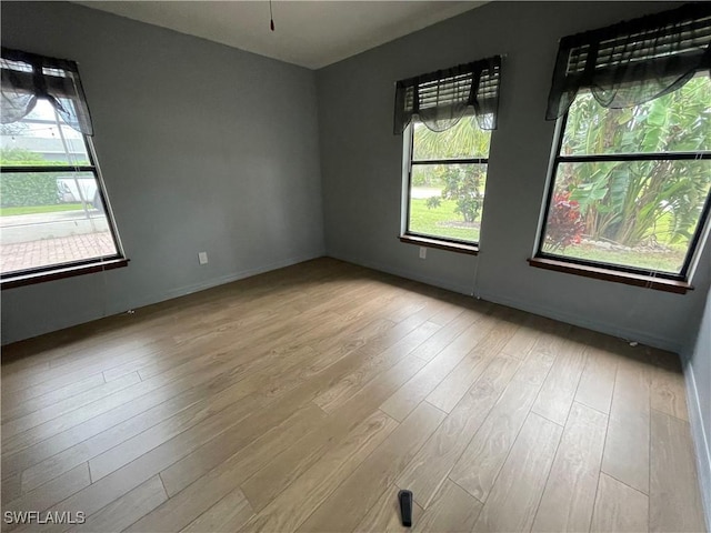 empty room with light wood-type flooring