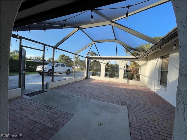 view of patio / terrace with glass enclosure