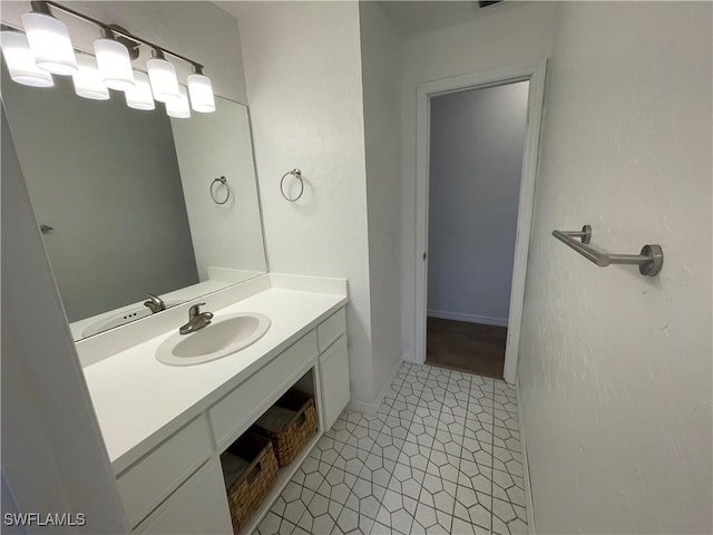 9882 Connecticut St, Bonita Springs, FL 34135 - bathroom featuring vanity and tile patterned flooring