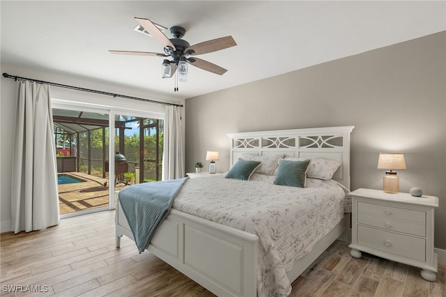 bedroom with light wood-type flooring, ceiling fan, and access to exterior