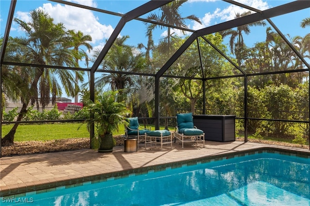 view of pool featuring a patio and a lanai