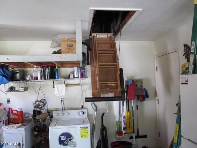 interior space with washing machine and clothes dryer