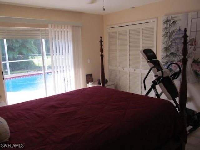 bedroom featuring a closet and access to outside