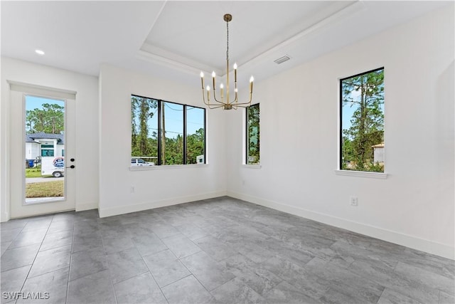 unfurnished room with a notable chandelier, recessed lighting, visible vents, baseboards, and a raised ceiling