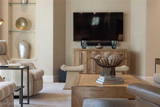 living room with light colored carpet