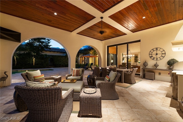 view of patio / terrace with area for grilling, outdoor lounge area, and a grill