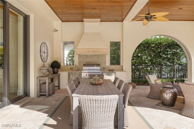 view of patio / terrace featuring area for grilling and ceiling fan