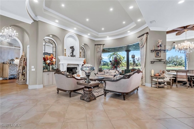 tiled living room with ceiling fan and ornamental molding