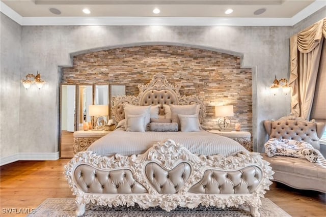 bedroom featuring hardwood / wood-style flooring