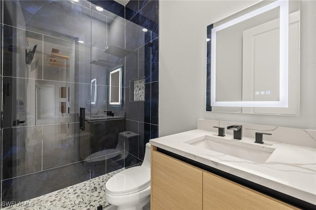 728 SW 8th Ter, Cape Coral, FL 33991 - bathroom featuring a shower stall, toilet, and vanity
