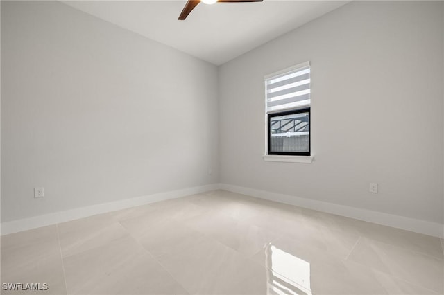 728 SW 8th Ter, Cape Coral, FL 33991 - unfurnished room with a ceiling fan, tile patterned floors, and baseboards