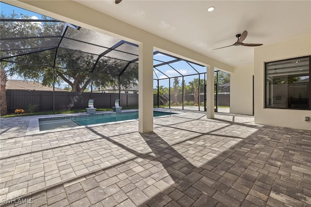 728 SW 8th Ter, Cape Coral, FL 33991 - view of pool featuring ceiling fan, a fenced backyard, a patio area, and glass enclosure
