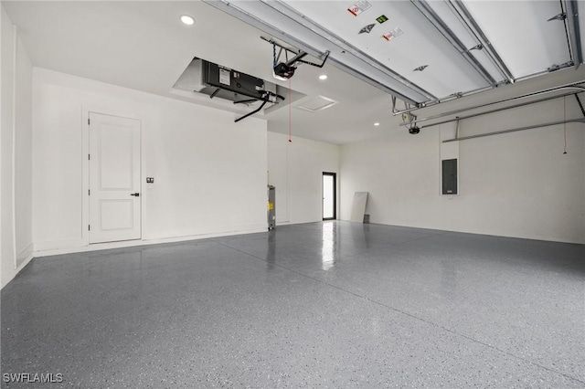 728 SW 8th Ter, Cape Coral, FL 33991 - garage with electric panel and a garage door opener