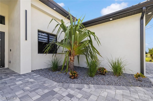 728 SW 8th Ter, Cape Coral, FL 33991 - view of property exterior featuring stucco siding