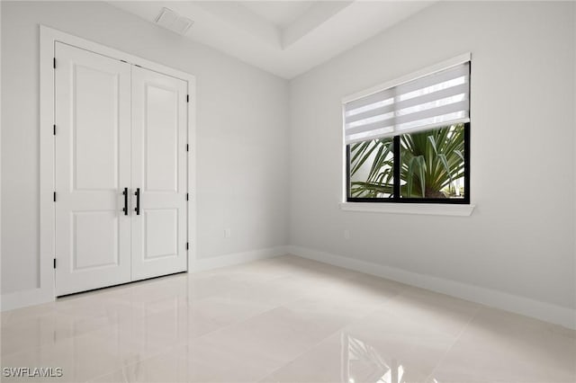 728 SW 8th Ter, Cape Coral, FL 33991 - empty room with baseboards and tile patterned flooring