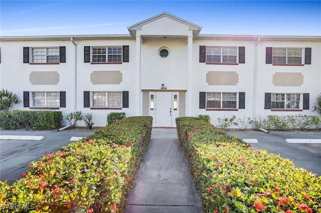 townhome / multi-family property with stucco siding